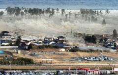 tsunami3-sweeps-in-to-engulf-a-residential-area-after-a-powerful-earthquake-in-natori.jpg